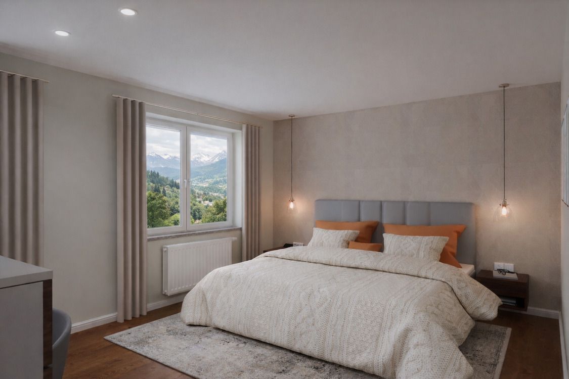 Helles Schlafzimmer mit Schminktisch, Einbauschrank und Panoramablick auf Berglandschaft